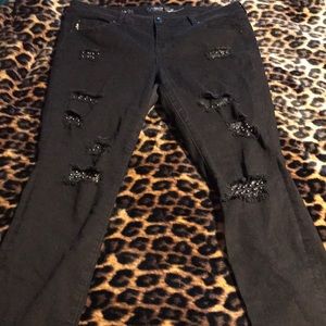 Black jeans with holes